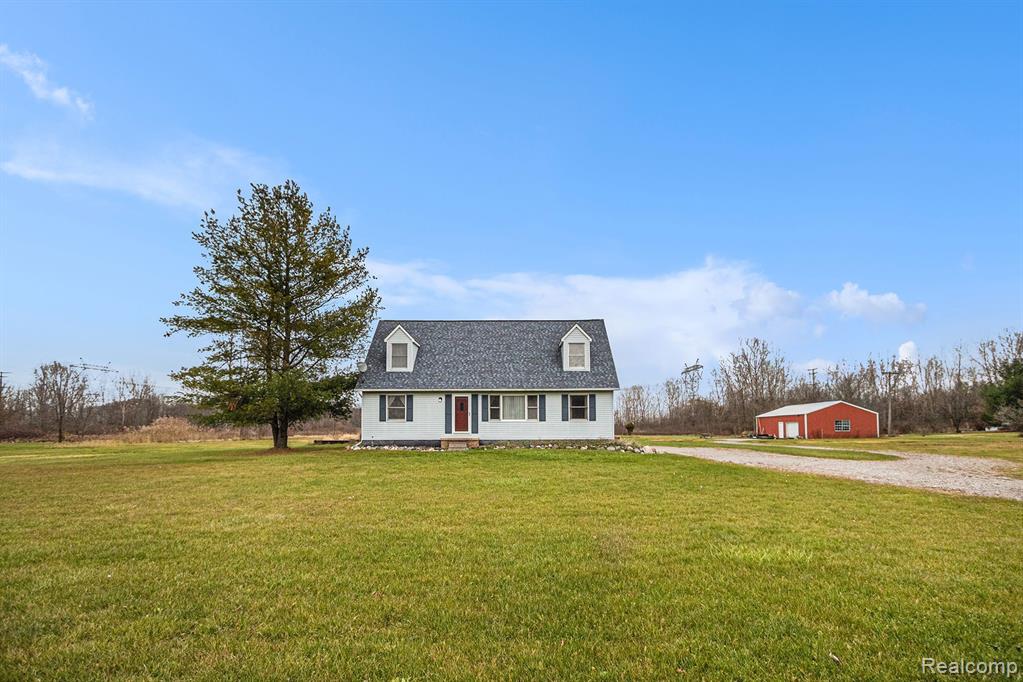 972 COVE Road, Wales, MI — front exterior