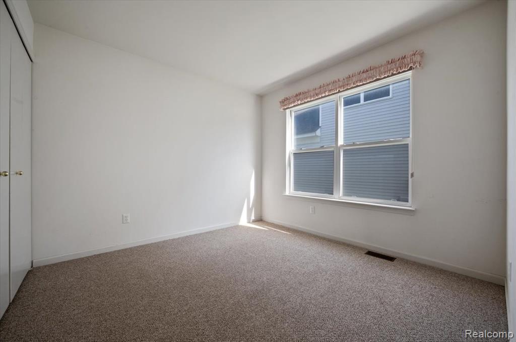 913 Rikki Ann Court, Wixom, MI 48393 — Photo 20