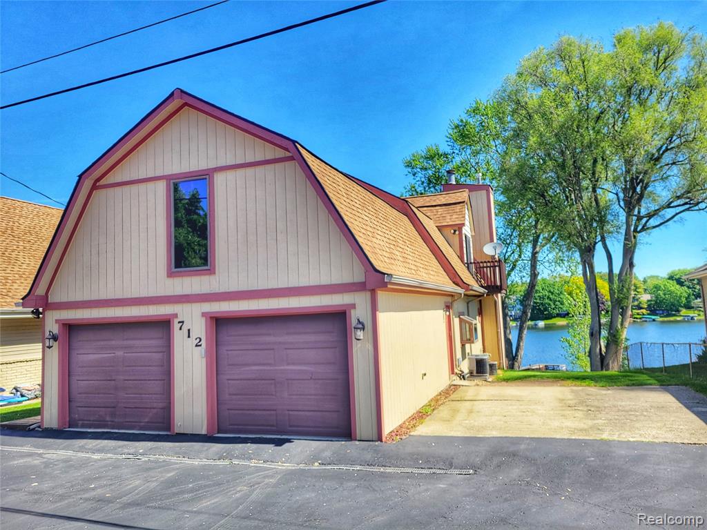 712 Wolverine Drive, Wolverine Lake, MI 48390 — Photo 44