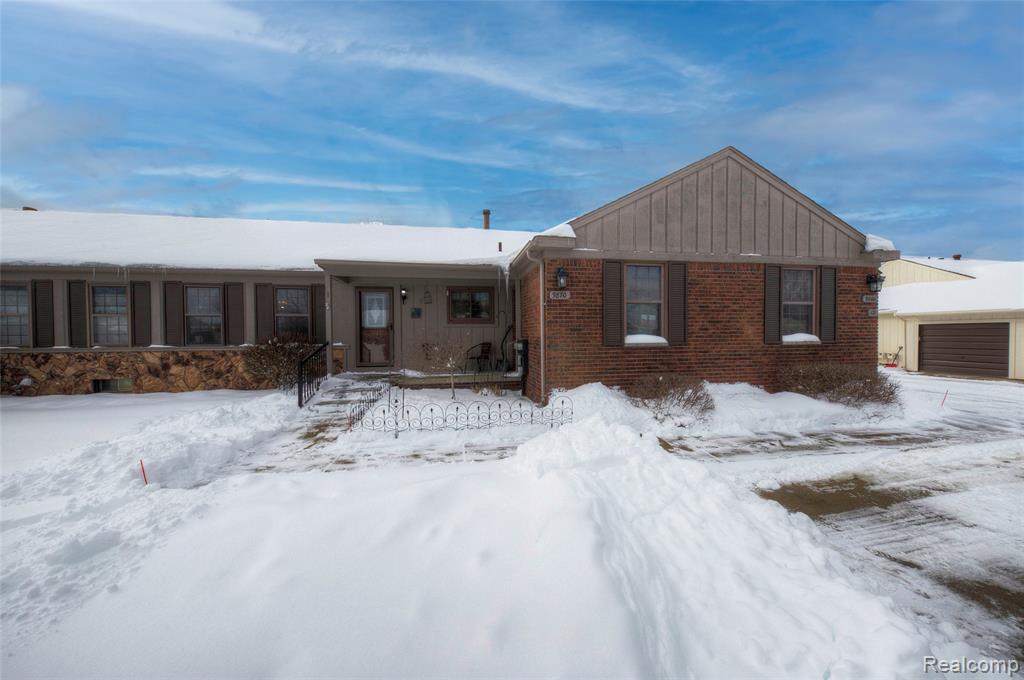 9870 Cambridge Court, 121-2, South Lyon, MI 48178 — front exterior