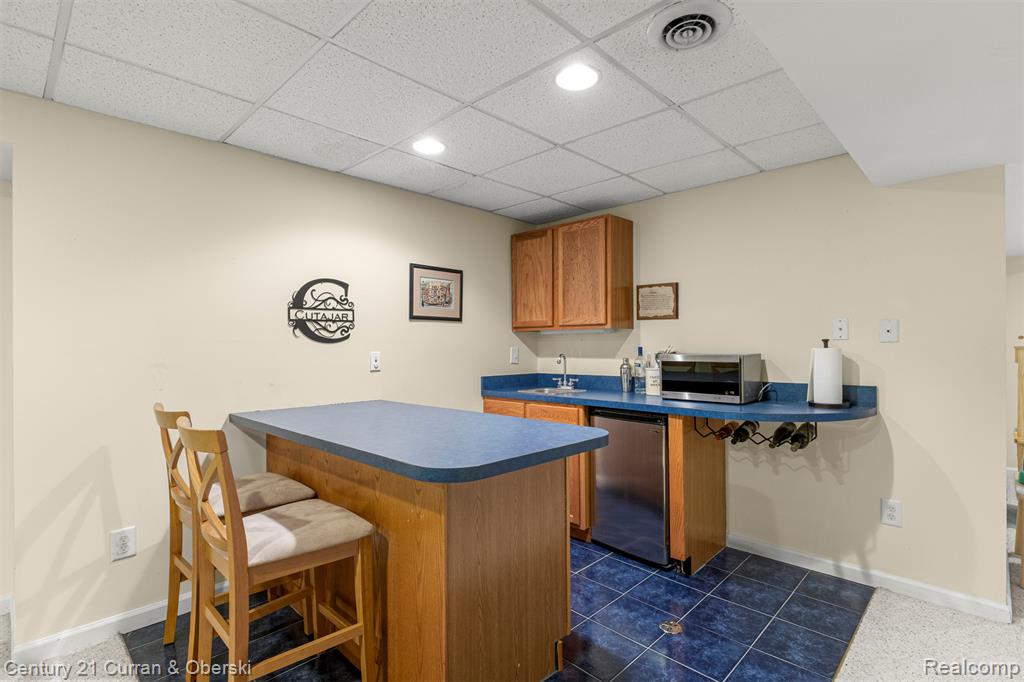 1424 Woodbridge Lane, Wixom, MI 48393 — Photo 63