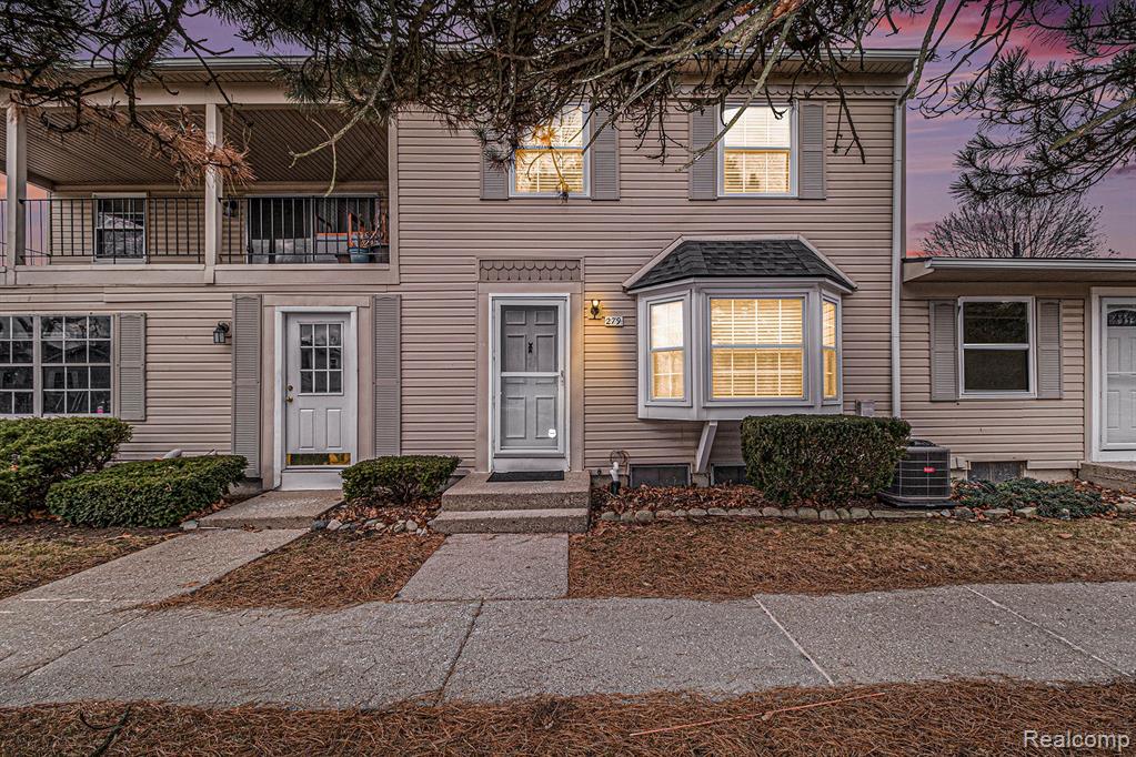 279 LAKE VILLAGE Drive, Walled Lake, MI 48390 — front exterior