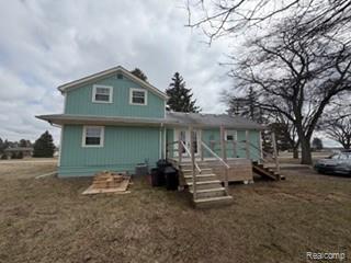 6590 Marsh Road, Cottrellville, MI — front exterior