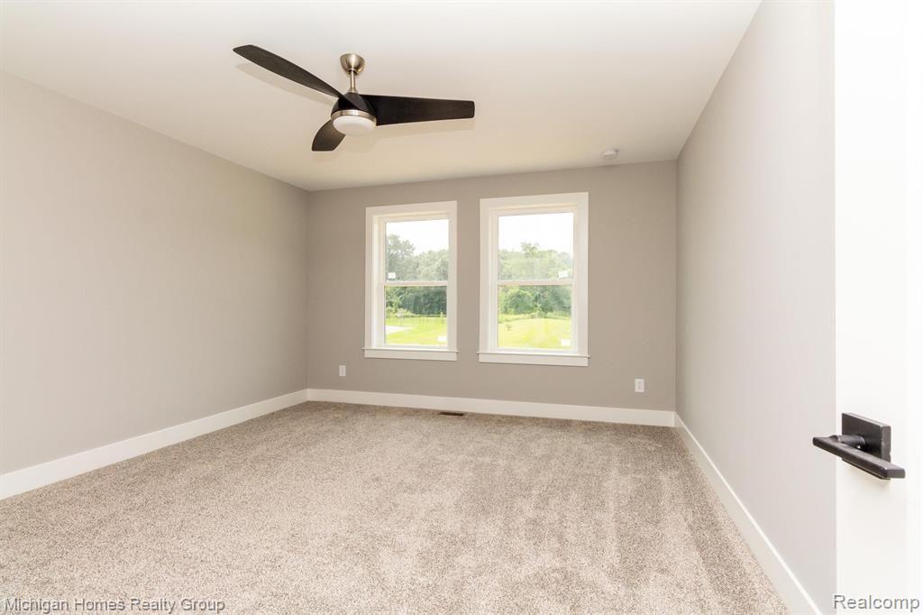 2910 LOON Drive, Wixom, MI 48393 — Photo 53