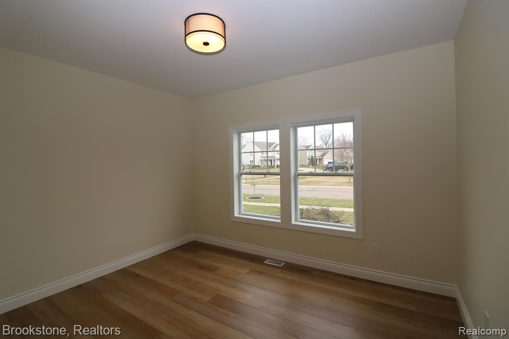 395 GENEVA Court, Howell, MI 48855 — Photo 16