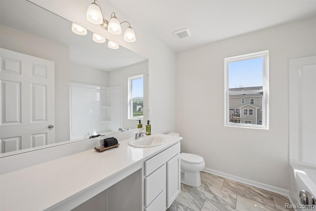606 Harvest Way, Chelsea, MI 48118 — Photo 25