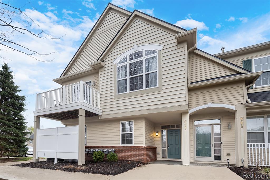 673 Abbington Court, Howell, MI 48843 — front exterior