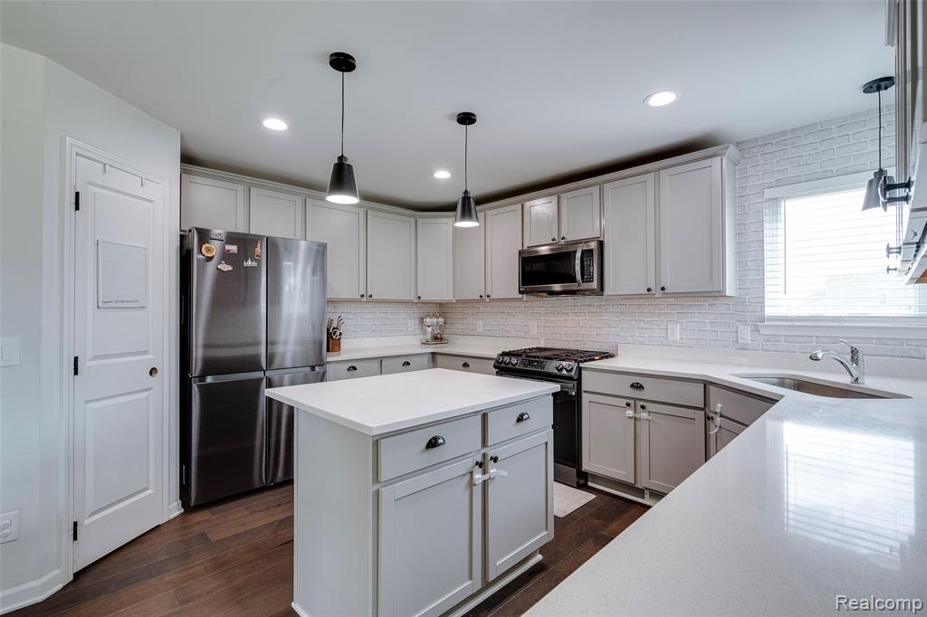 569 Pattan Drive, Wixom, MI 48393 — Photo 16