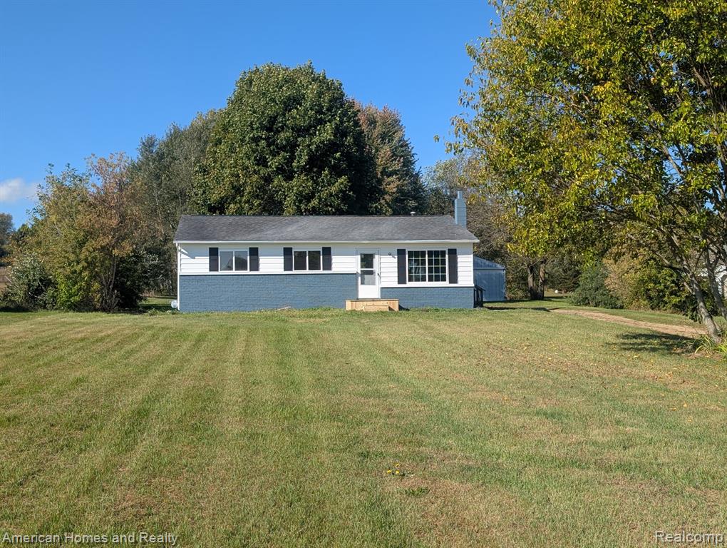 6585 N Lake Road, Otter Lake, MI 48464 — front exterior