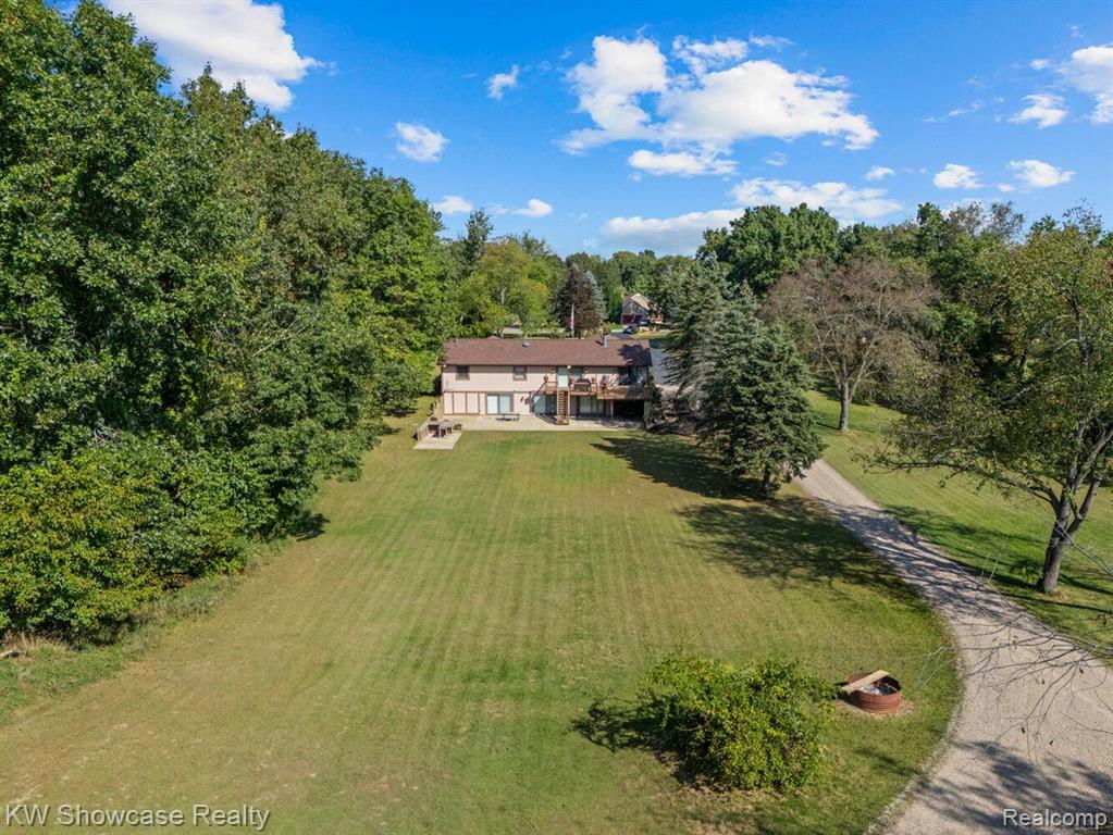 766 WHITE HOUSE Drive, Highland, MI 48356 — Photo 66