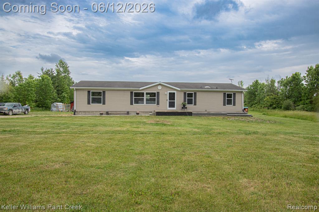 9795 Lambs Road, Wales, MI — front exterior
