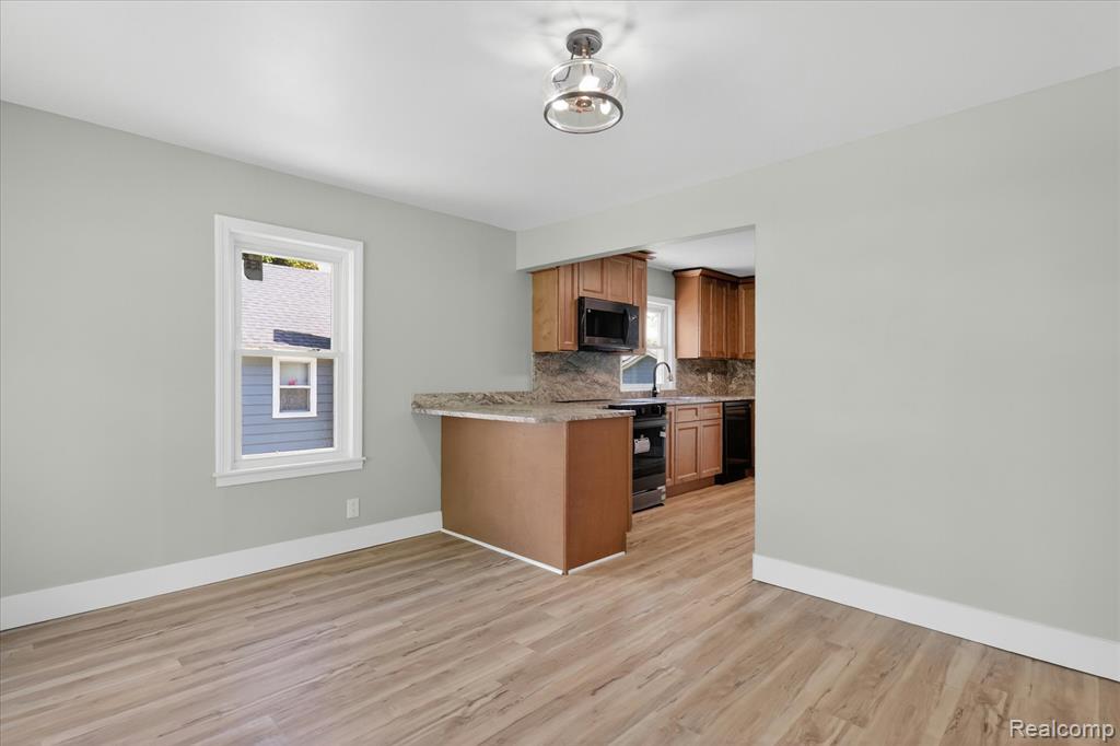 677 Lucille Drive, Wolverine Lake, MI 48390 — Photo 10