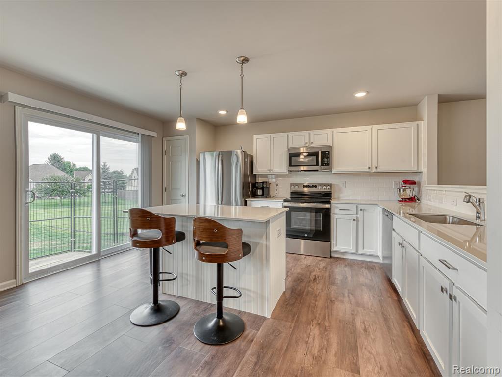 410 Settlers Cove, Tecumseh, MI 49286 — front exterior