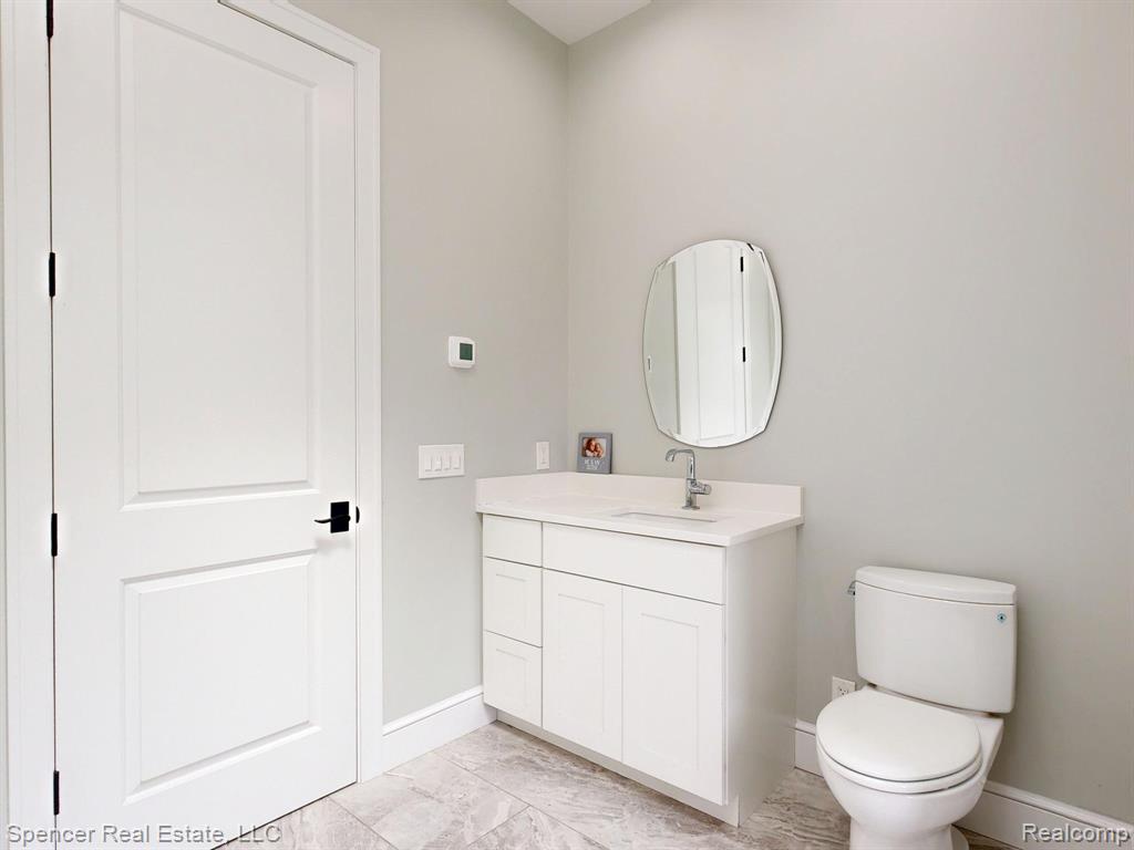 571 Dunleavy Drive, Highland, MI 48356 — Photo 35