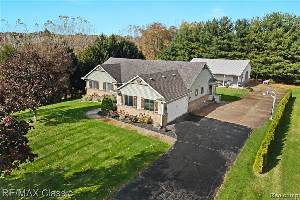 13947 Hearthstone Lane, Hartland, MI 48353 — Photo 41