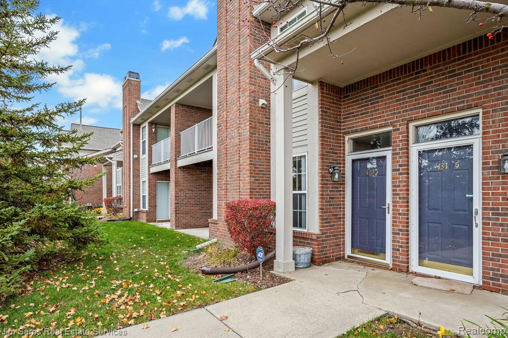 43115 WOODBRIDGE Drive, Clinton Twp, MI 48038 — front exterior
