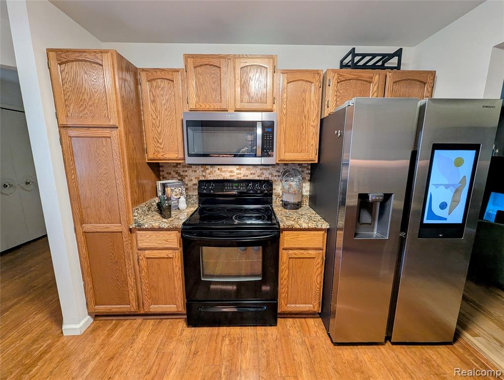 840 Woodridge Hills Drive, Brighton, MI 48116 — Photo 36