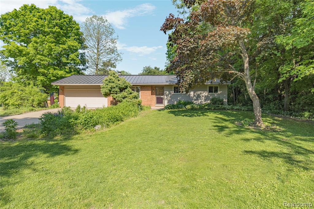 760 Waterbury Road, Highland, MI 48356 — Photo 4