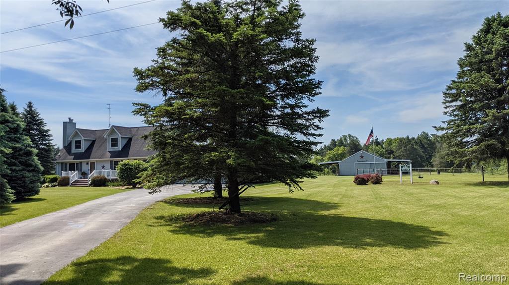 9753 W Coon Lake Road, Webberville, MI 48892 — Photo 48