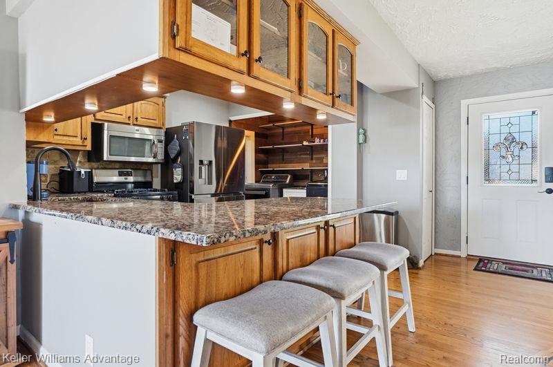 1210 Craven Drive, Highland, MI 48356 — Photo 14