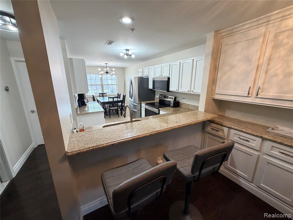421 Village Drive, Walled Lake, MI 48390 — Photo 9