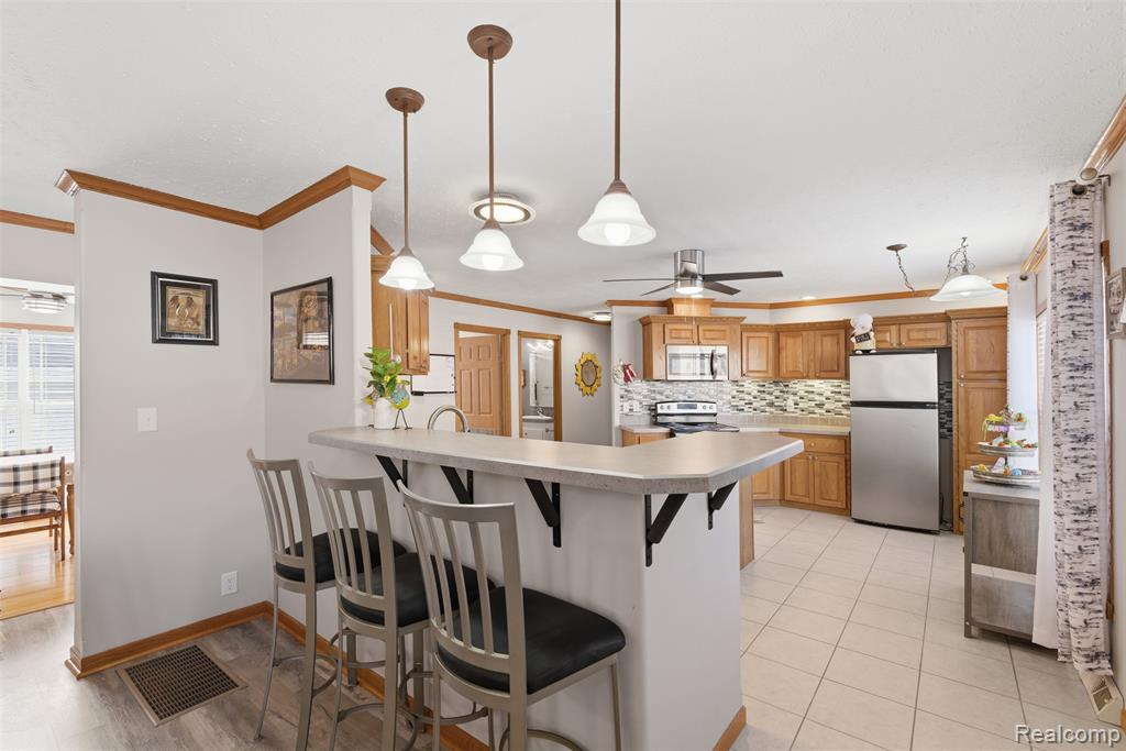 11050 Willowgreen Court, South Lyon, MI 48178 — Photo 11