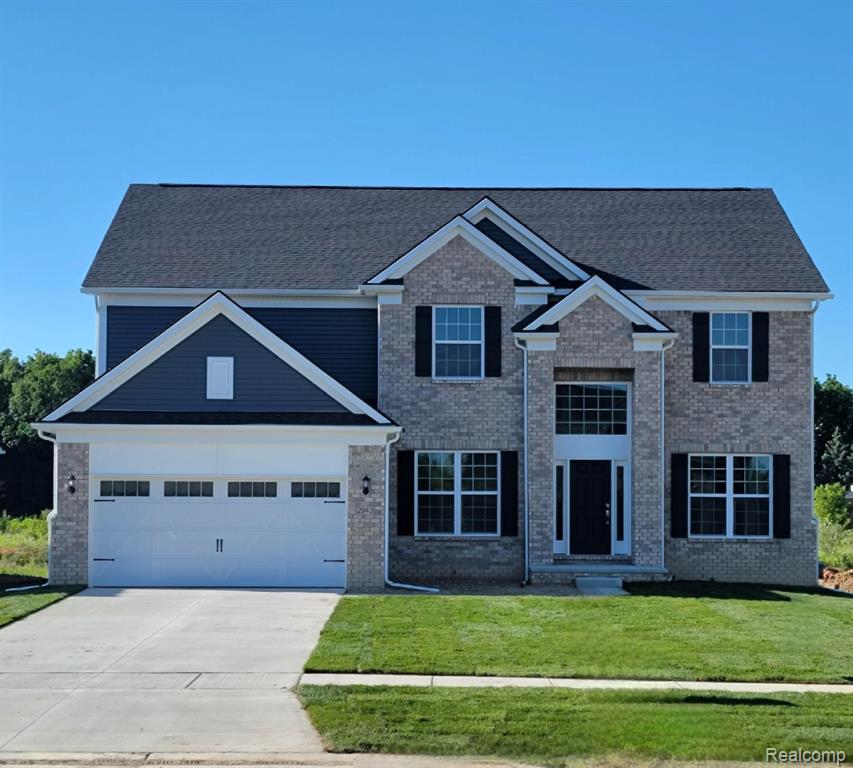 51311 Green Meadows Drive, Macomb, MI 48042 — front exterior