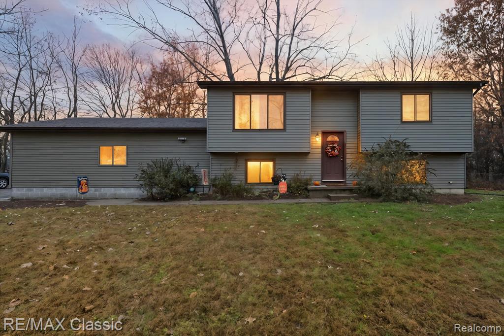 5594 Harper Road, Holt, MI 48842 — front exterior