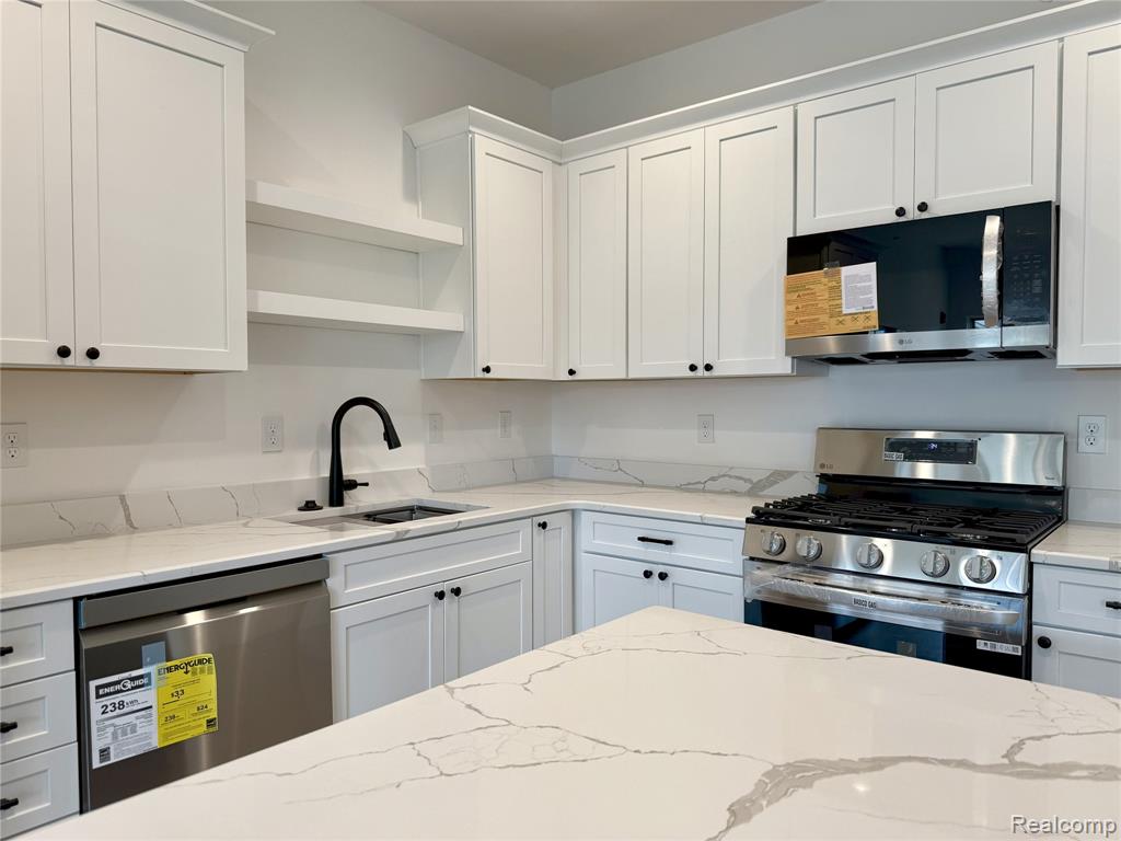 437 Village Drive, Walled Lake, MI 48390 — Photo 13