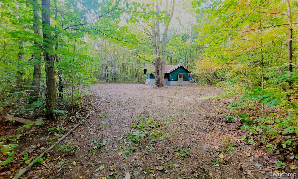 7528 OLD STUMP Road, Gaylord, MI 49735 — front exterior