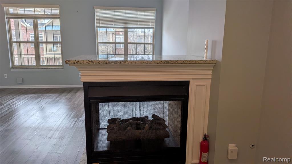 413 VILLAGE Drive, Walled Lake, MI 48390 — Photo 17