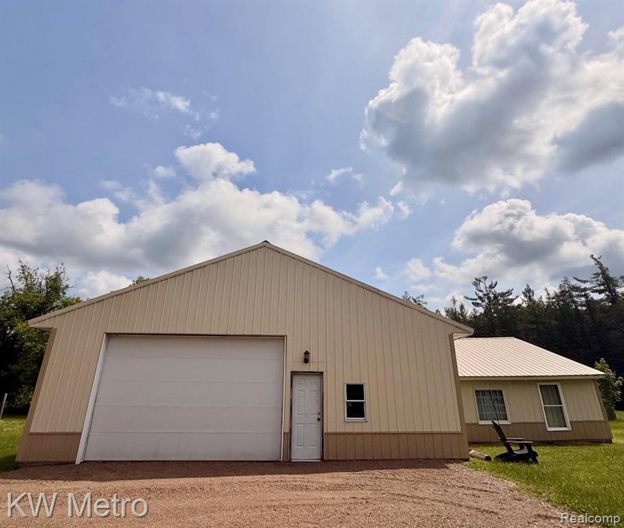 5749 Schultz Road, Indian River, MI 49749 — front exterior