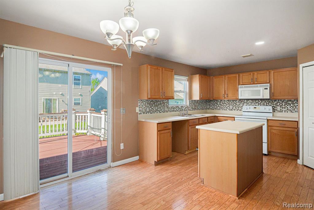 8608 RIFLE RIVER Drive, Fowlerville, MI 48836 — Photo 8