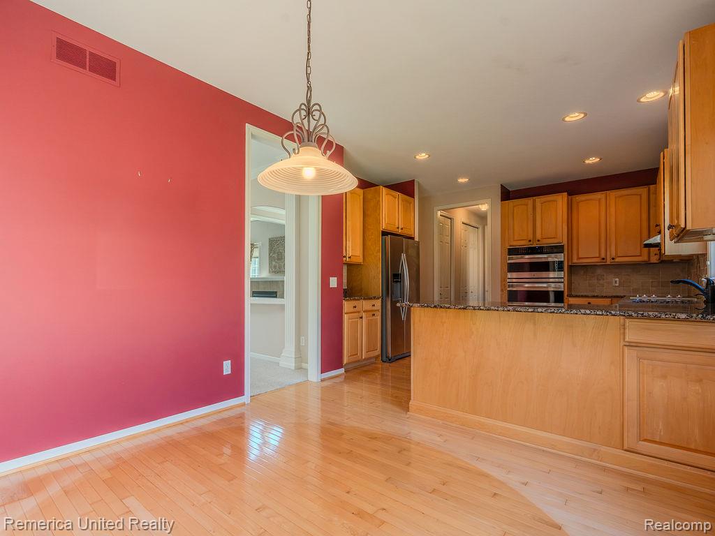 7429 Pine Vista Drive, Brighton, MI 48116 — Photo 15