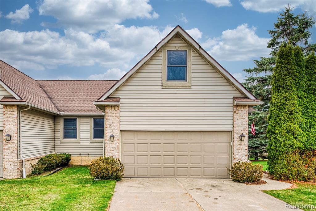 216 Canterbury Court, Linden, MI 48451 — front exterior