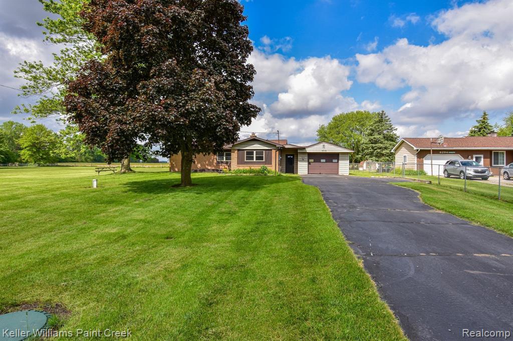 9316 EAST Road, Burt, MI 48417 — front exterior