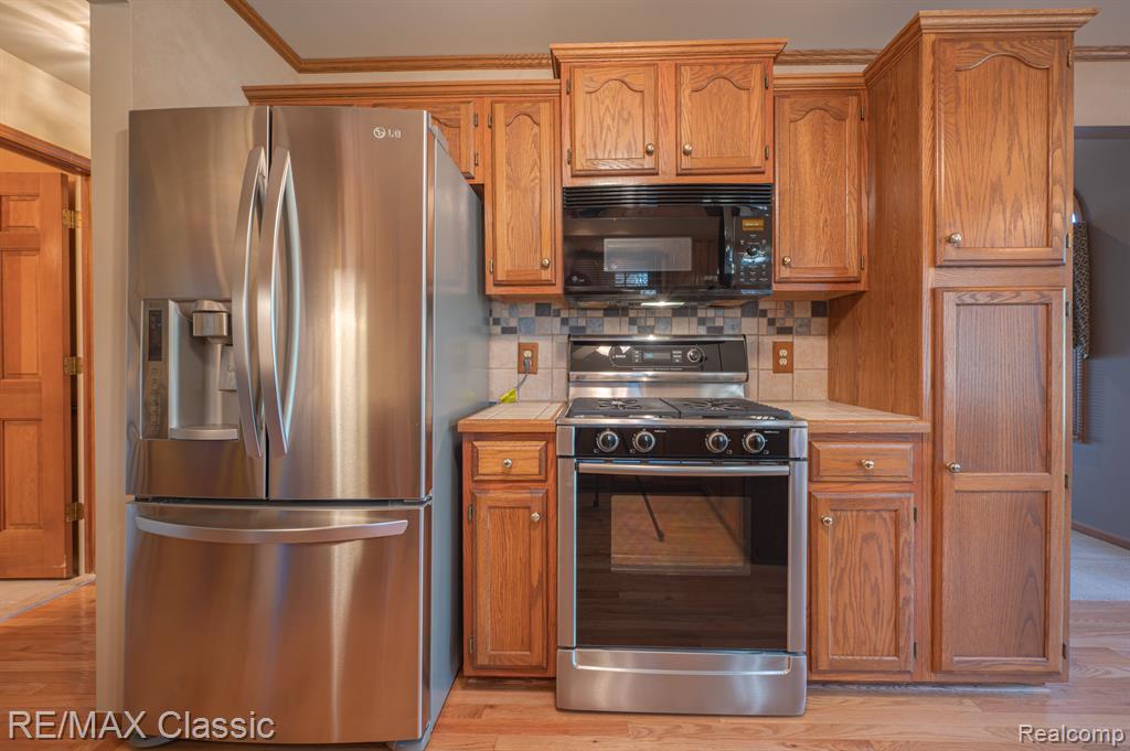 1049 ELMWOOD Drive, 13, Brighton, MI 48116 — Photo 6