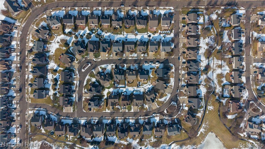 View of property location featuring nearby suburban area