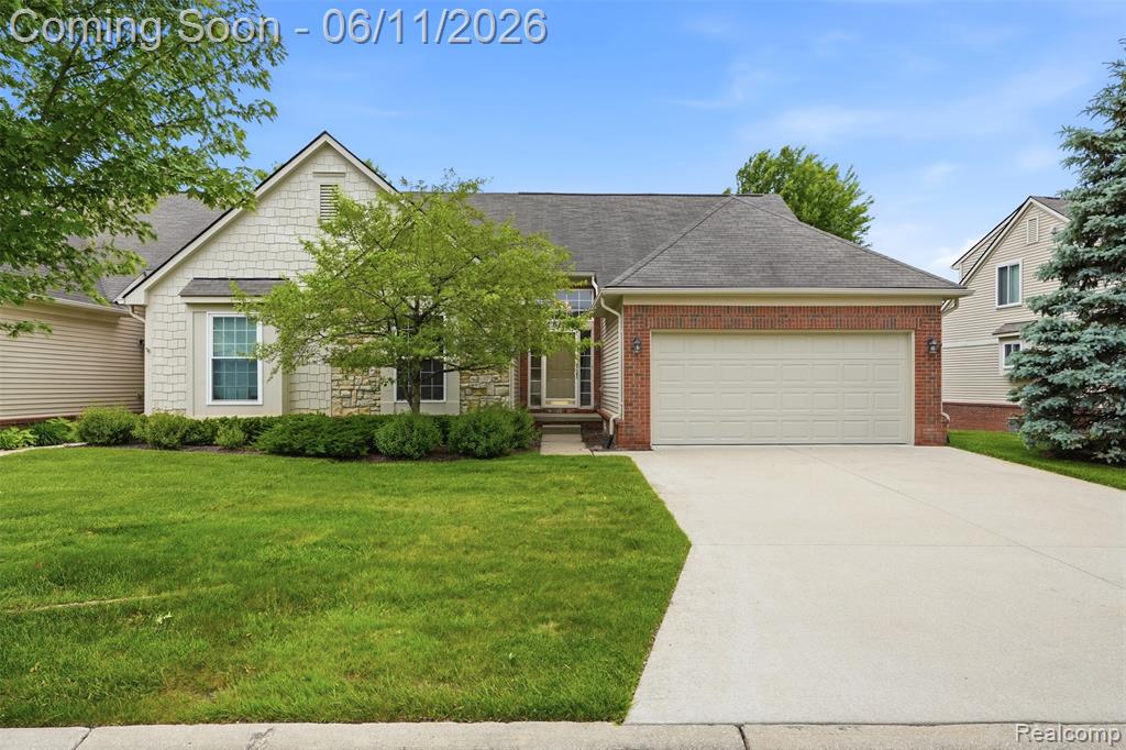 28101 Tremonte Drive, 72, New Hudson, MI 48165 — front exterior