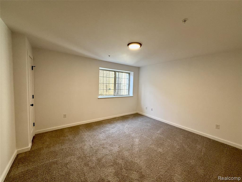 435 Village Drive, Walled Lake, MI 48390 — Photo 25