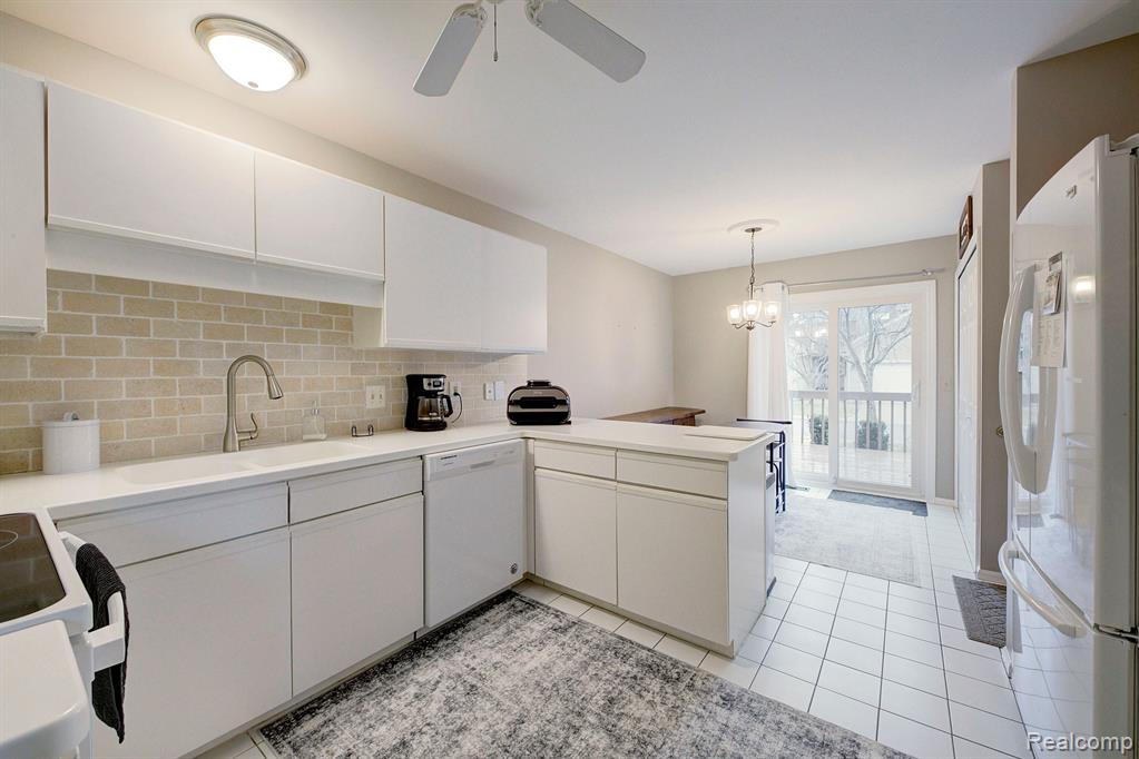 9329 EASTWIND Drive, Livonia, MI 48150 — Photo 18