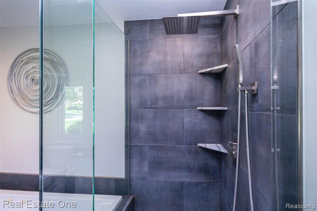 Euro glass and porcelain tiled shower