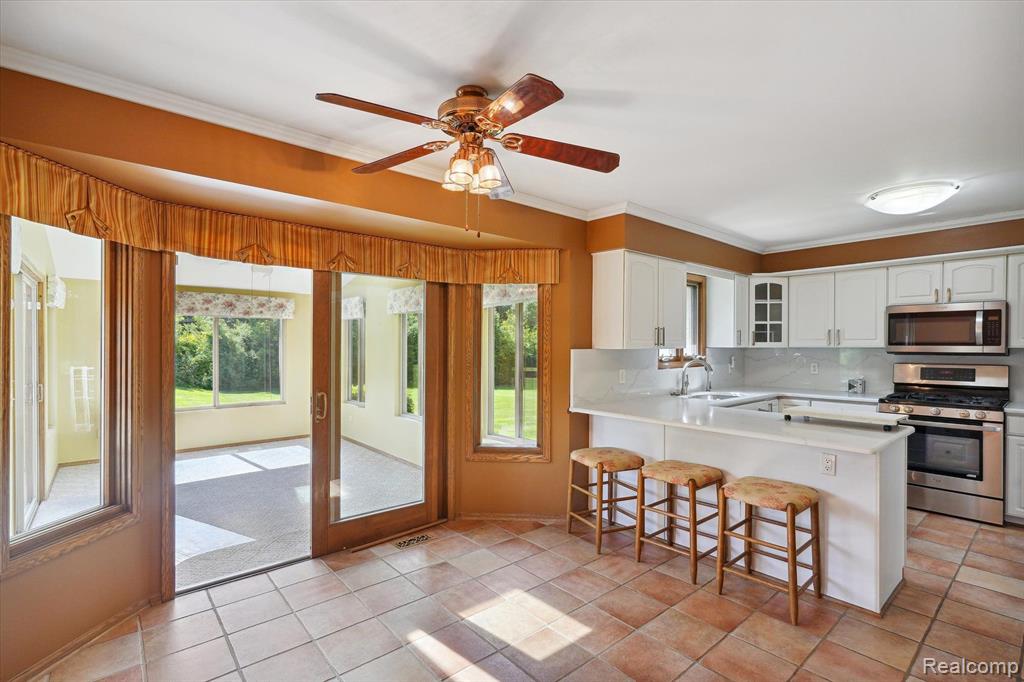 4747 WINDBERRY Lane, Milford, MI 48380 — Photo 16