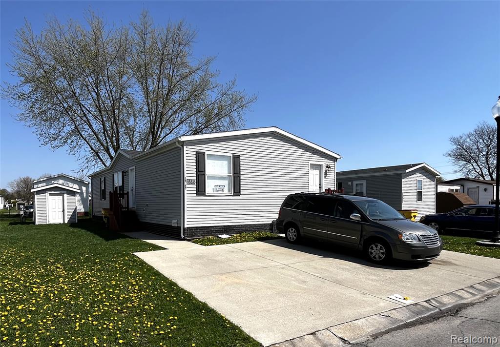15385 Cartier Drive, Clinton Twp, MI 48038 — front exterior