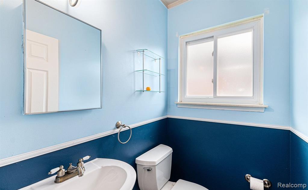 Bathroom featuring toilet and a sink