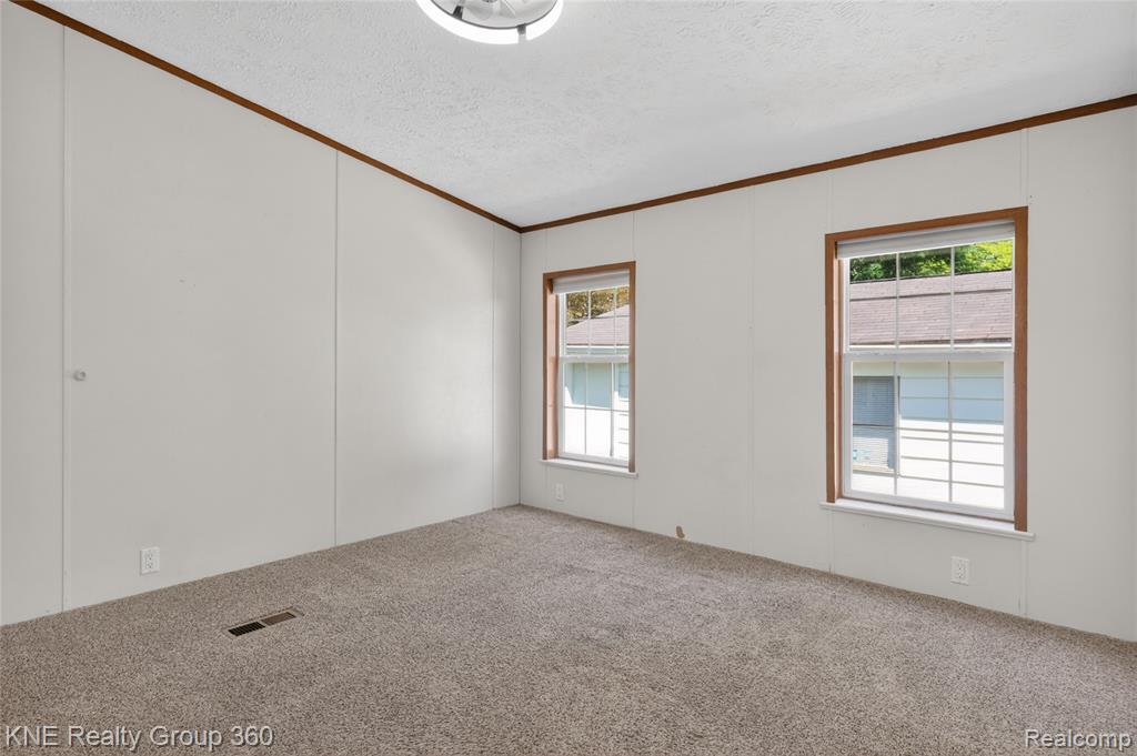 672 Red Oaks Drive, Howell, MI 48843 — Photo 20
