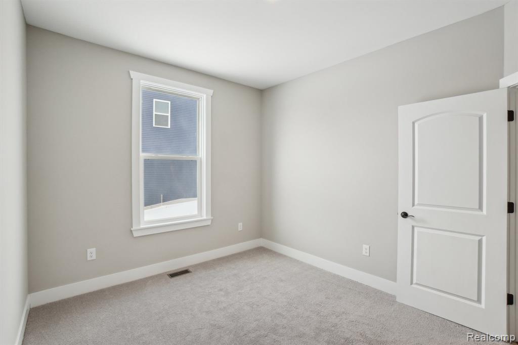 677 Round Rock Dr, Howell, MI 48843 — Photo 18