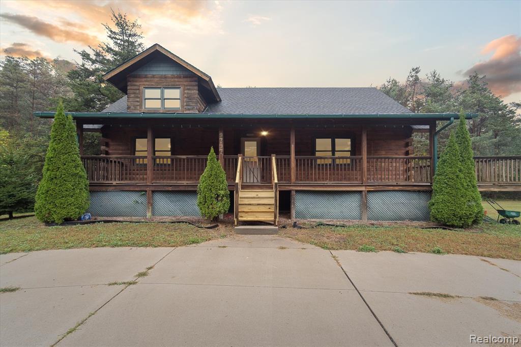 9797 Rolling Pines Drive, Brighton, MI 48116 — front exterior