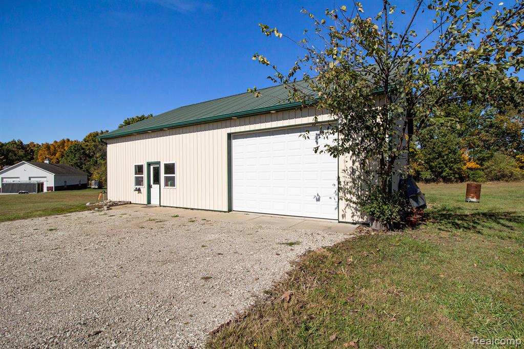 703 N Hughes Road, Howell, MI 48843 — Photo 31