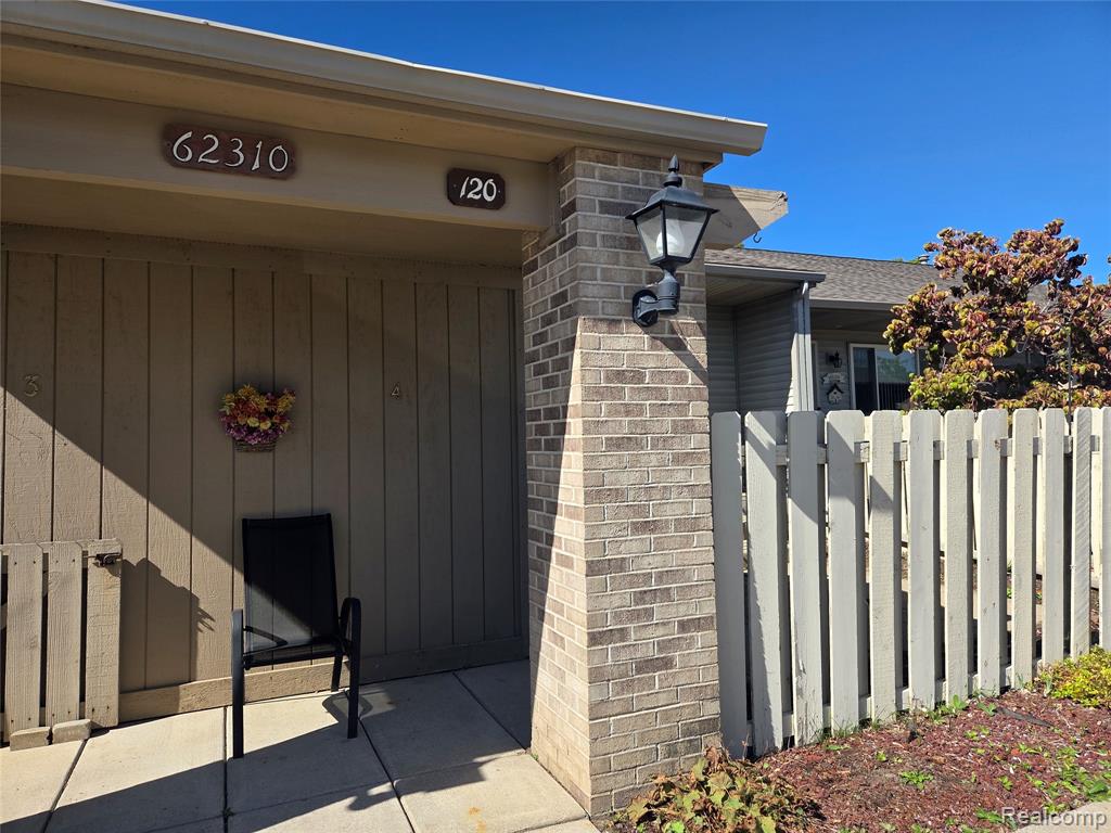 62310 Arlington Circle, 4, South Lyon, MI 48178 — front exterior